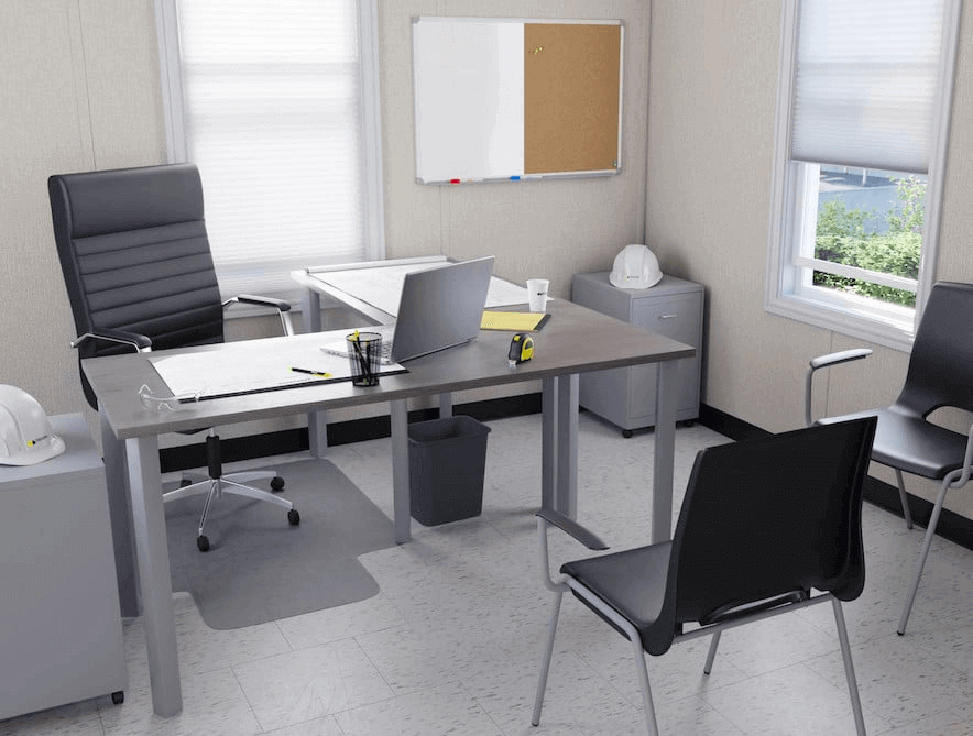 Modern office interior showcasing a desk, chair, and whiteboard, ideal for modular construction projects and triumph modular solutions.